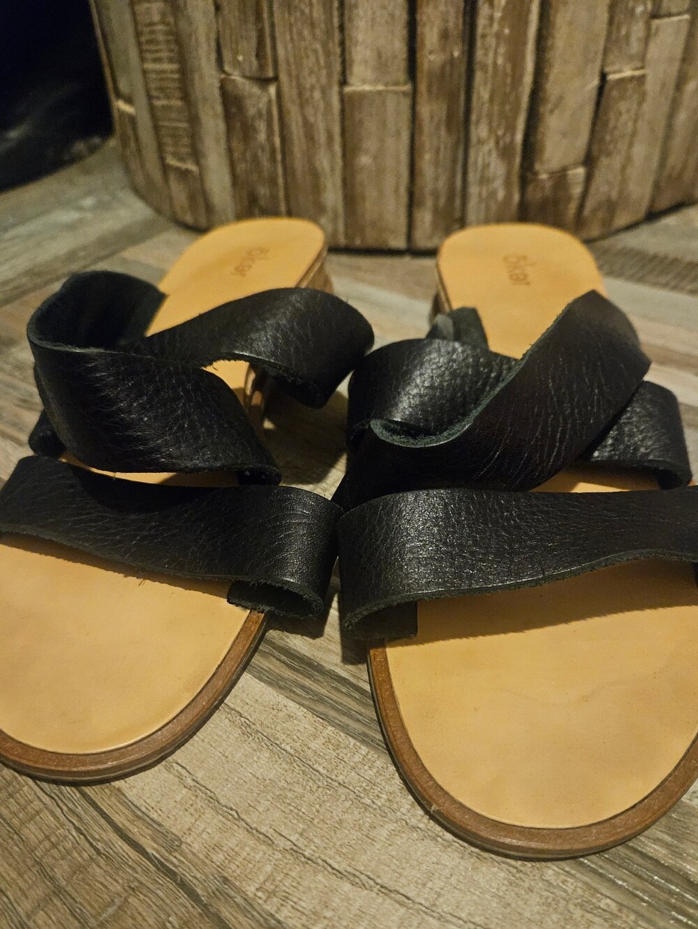 Oker black leather criss-cross slide sandals. 39. 8.5US
